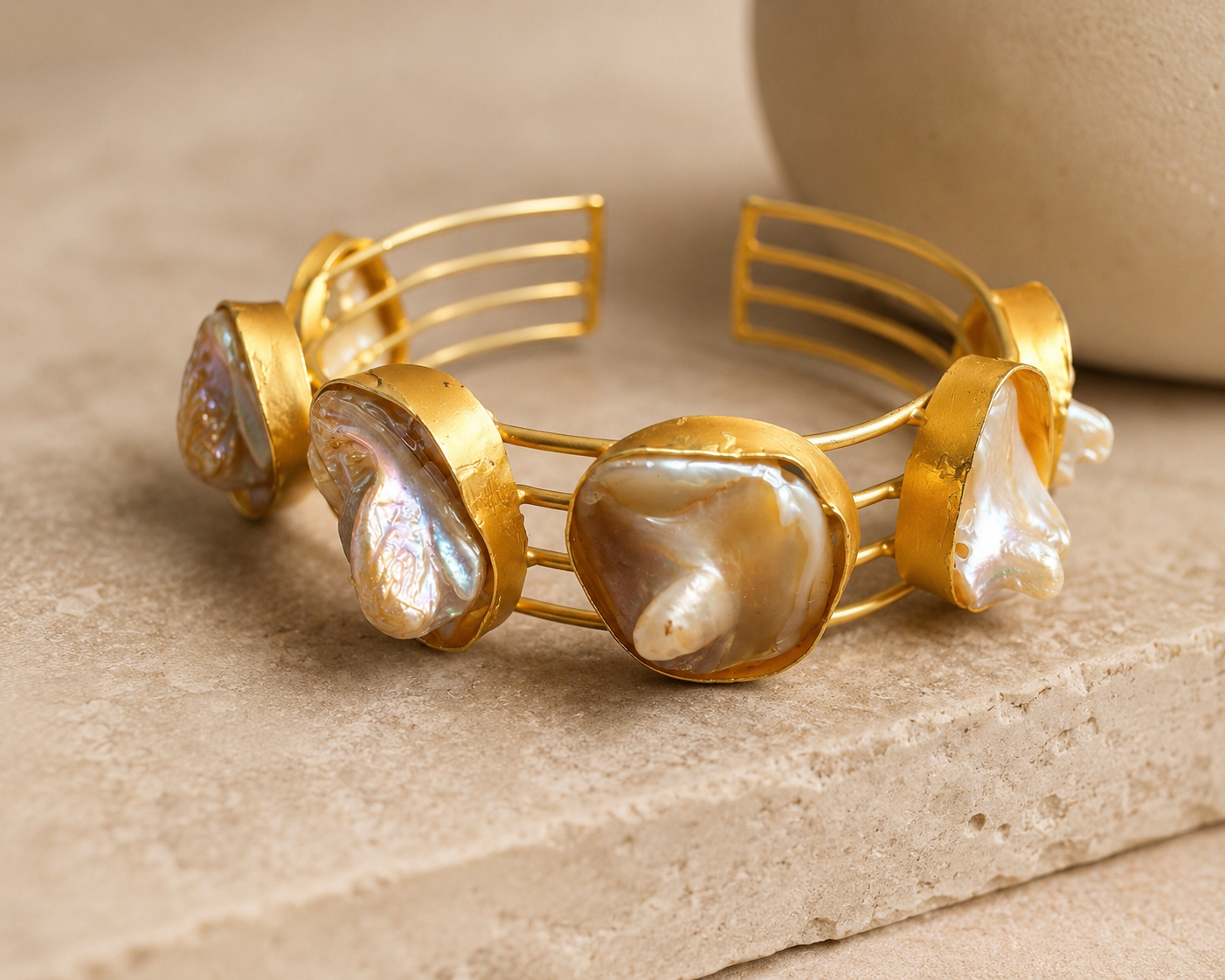 Macro detail of baroque pearl cuff bracelet